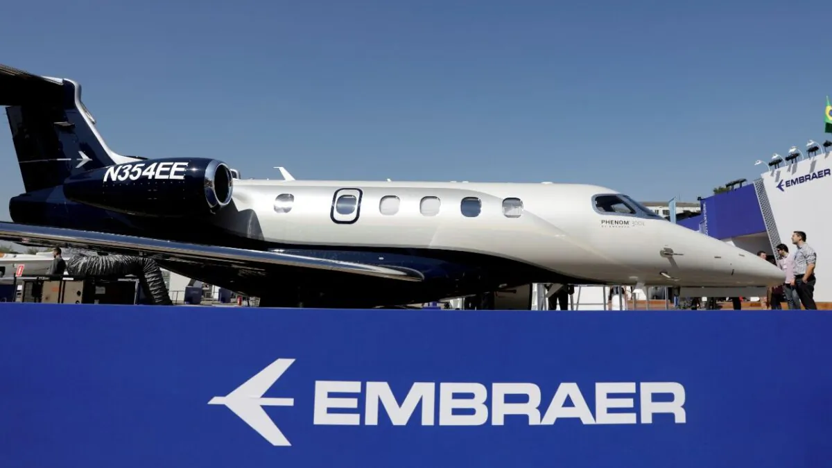 An Embraer Phenom 300E aircraft is displayed during the Latin American Business Aviation Conference & Exhibition fair at Congonhas Airport in Sao Paulo, Brazil, on Aug.14, 2018. (Paulo Whitaker/Reuters)
