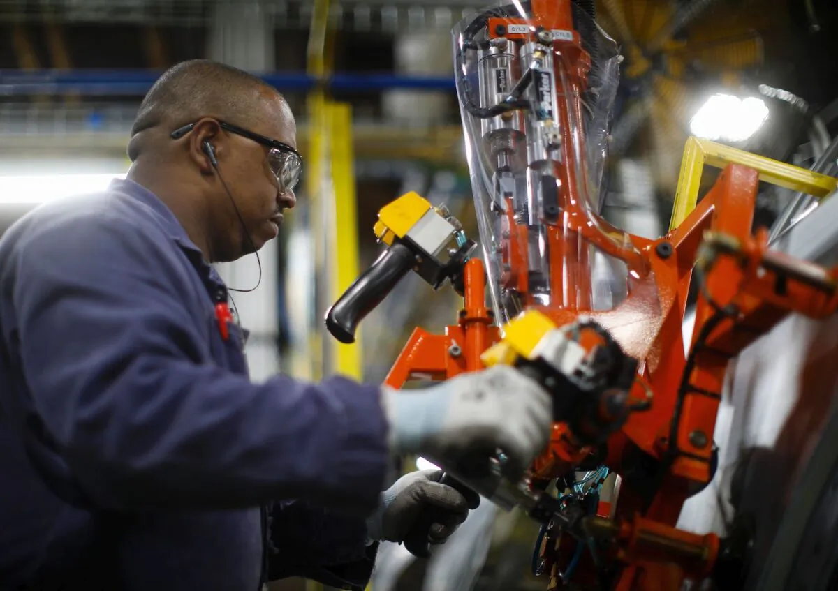 A 2019 file image of a worker at a newly renovated Ford's Assembly Plant in Chicago. (Jim Young/AFP via Getty Images)