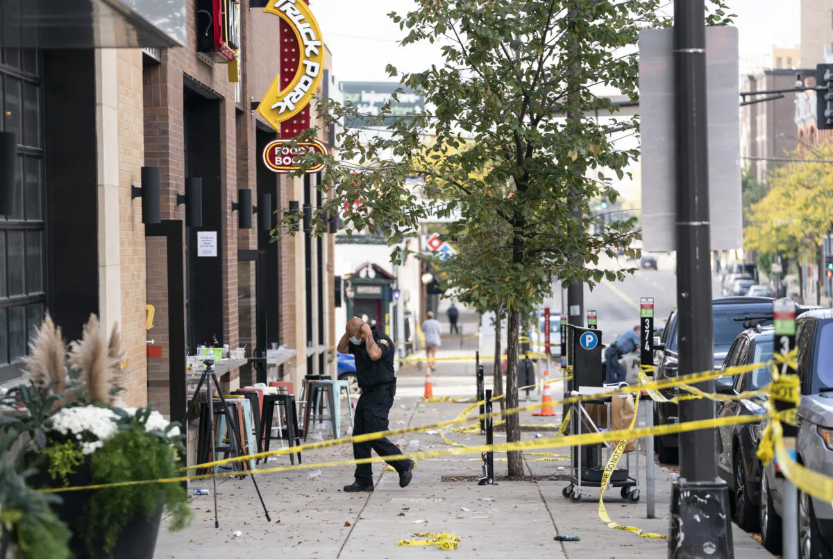 Investigators processed the chaotic scene of a multiple shooting at the bar Truck Park in St. Paul, Minn., that happened after midnight on Oct. 10, 2021. (Renee Jones Schneider/Star Tribune via AP)
