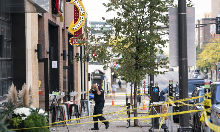 Investigators processed the chaotic scene of a multiple shooting at the bar Truck Park in St. Paul, Minn., that happened after midnight on Oct. 10, 2021. (Renee Jones Schneider/Star Tribune via AP)