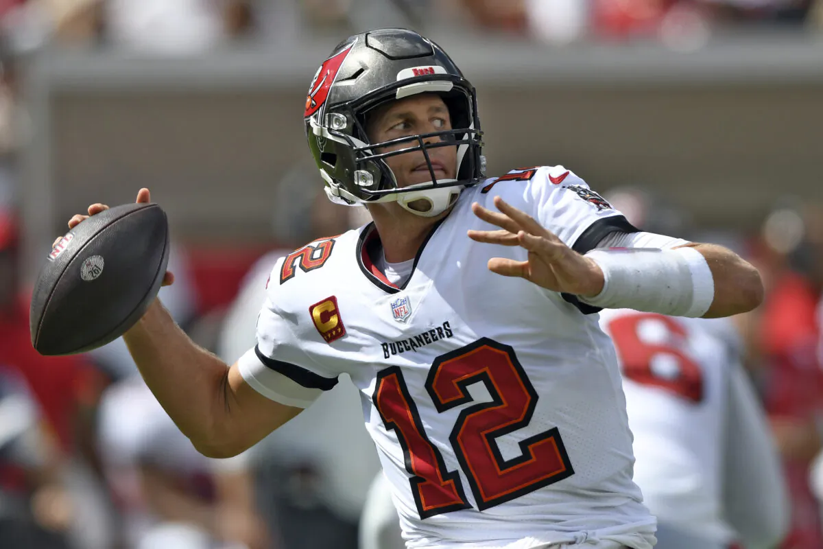 Tampa Bay Buccaneers quarterback Tom Brady (12) throws a pass against the Miami Dolphins during the first half of an NFL football game in Tampa, Fla., on Oct. 10, 2021. (Jason Behnken/AP Photo)