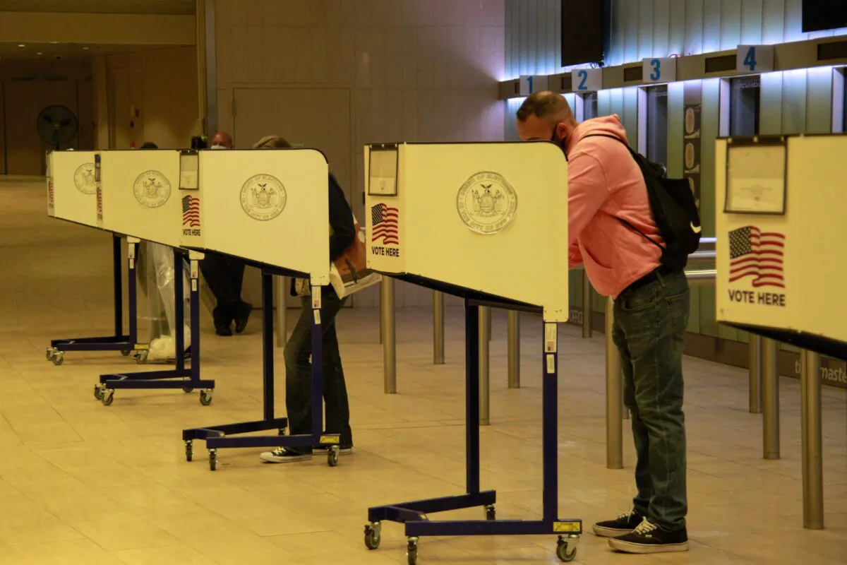 New York City voters cast their ballots at the early voting station in Madison Square Garden on Oct. 24, 2020. (Xiaotang Huang/The Epoch Times)