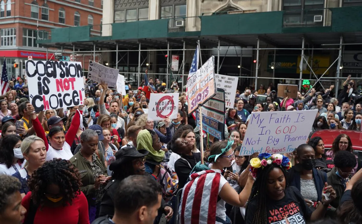 Teachers and others protesting against vaccination mandates in front of the Department of Education building in Brooklyn, New York City, on Oct. 4, 2021. (Petr Svab/The Epoch Times)