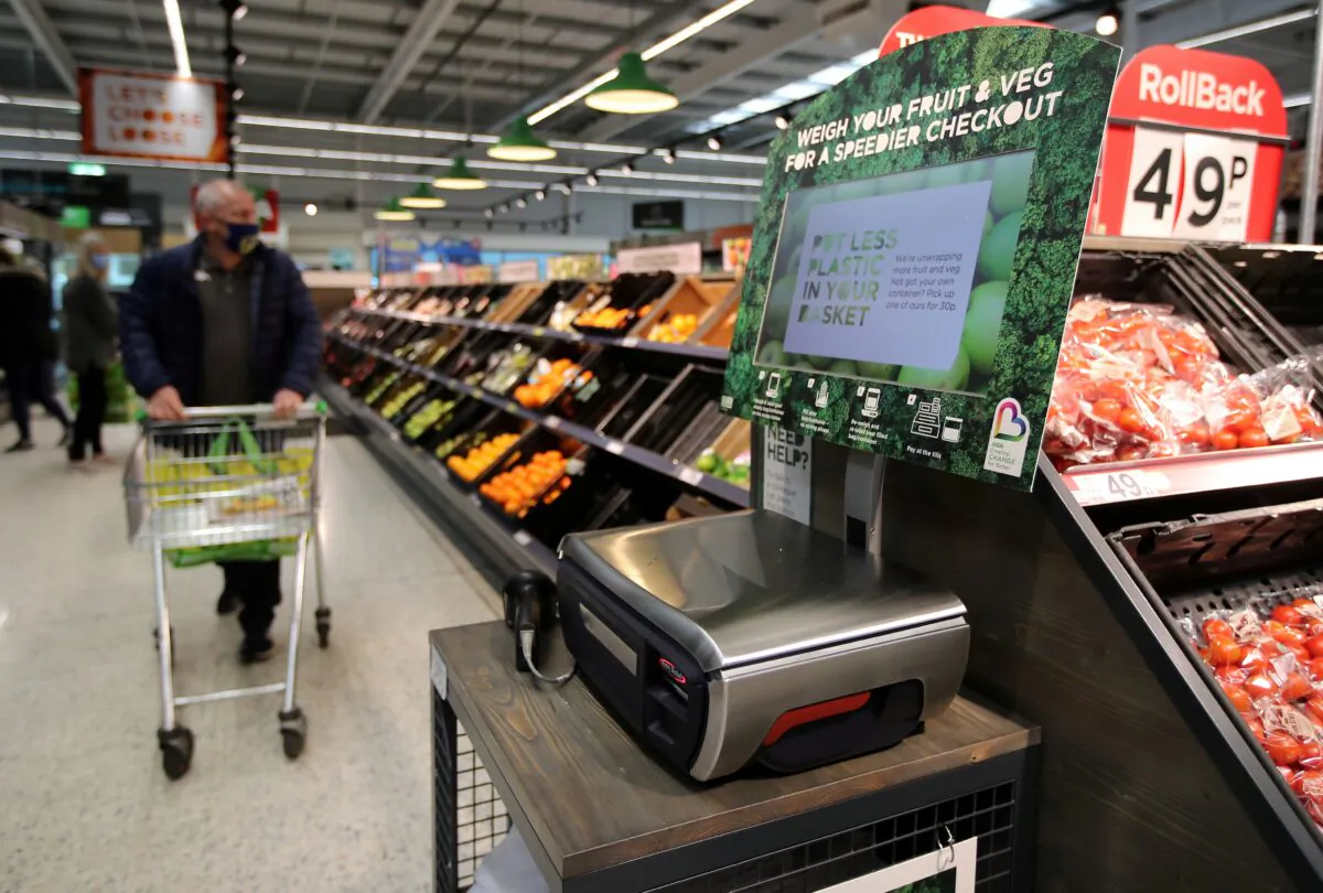 Scales to weigh loose fresh produce are seen in the supermarket Asda in Leeds, Britain, on Oct. 19, 2020. (Molly Darlington/Reuters)