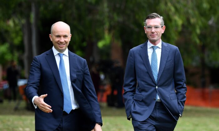 NSW Premier Dominic Perrottet (R) and NSW Treasurer Matt Kean leave a press conference in Sydney, Australia, on Oct. 12, 2021. (AAP Image/Joel Carrett)