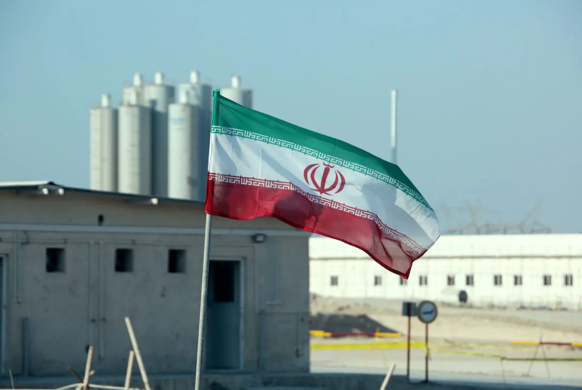An Iranian flag in Iran's Bushehr nuclear power plant, during an official ceremony to kick-start works on a second reactor at the facility on Nov. 10, 2019. (Atta Kenare/AFP via Getty Images)