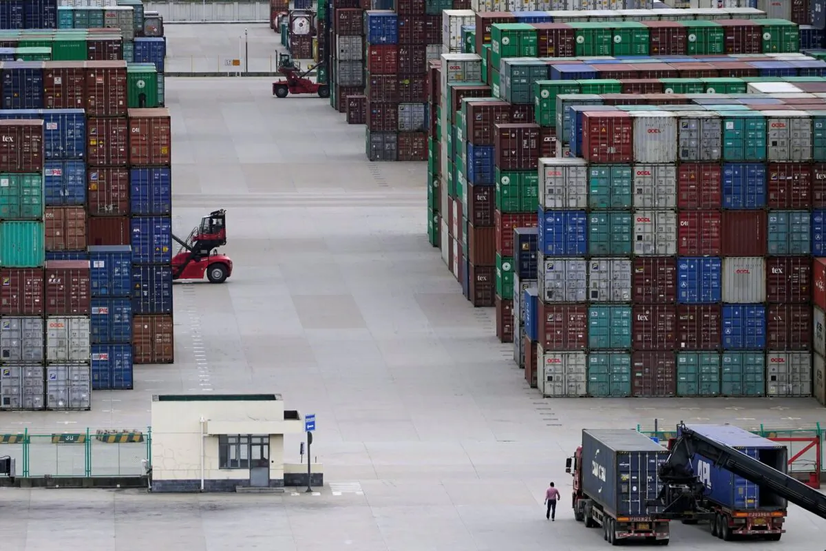 Shipping containers at the Yangshan Deep-Water Port in Shanghai, China, on Oct.  19, 2020. (Aly Song/Reuters)