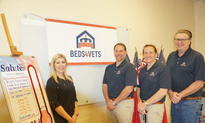 From left: Lisa McGuire from the Hockessin Athletic Club with Christopher Cascio, Zachary Bagdon, and Rick Martin from Beds4Vets. (Lily Sun/  Pezou)