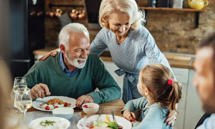 Make dinnertime a time to connect with and bond as a family—without phones in sight. (Drazen Zigic/Shutterstock)