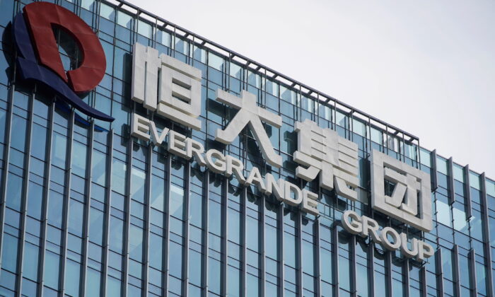  company logo is seen on the headquarters of China Evergrande Group in Shenzhen, Guangdong Province, China, on Sept. 26, 2021. (Aly Song/Reuters)