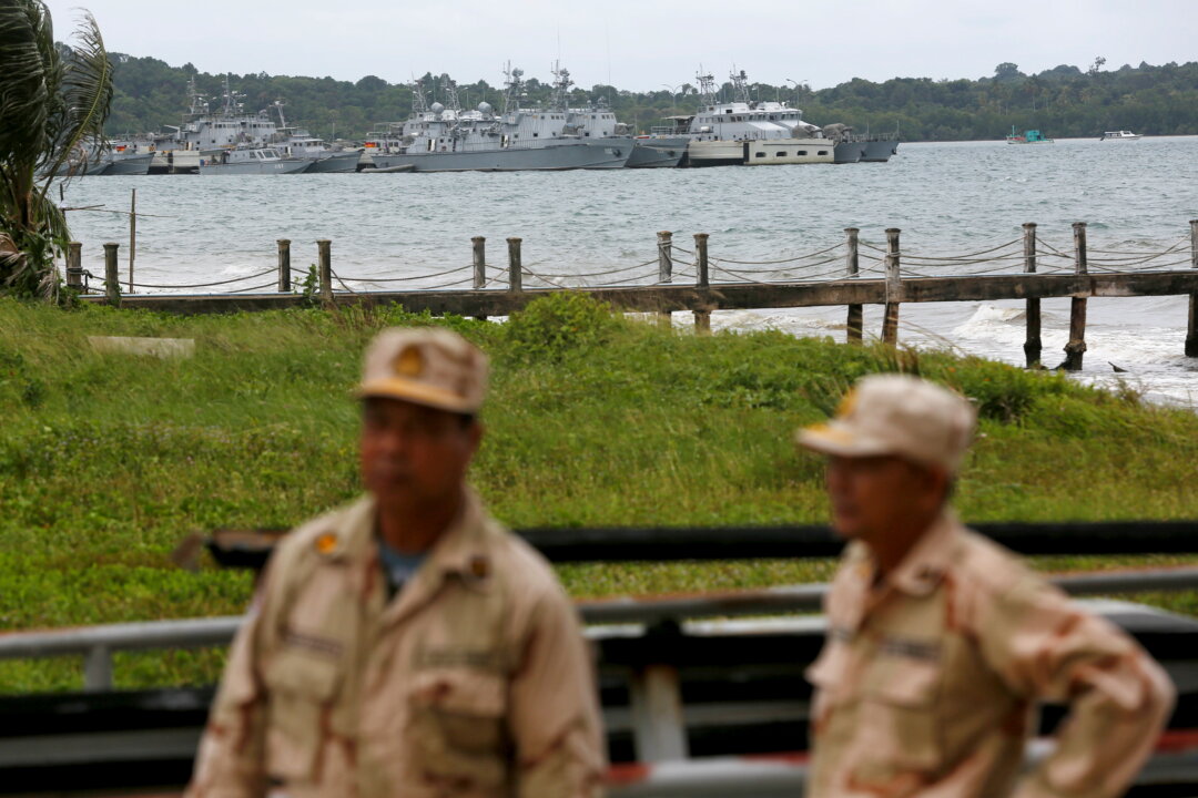 Sailors stand guard at the Cambodian Ream Naval Base in Sihanoukville, Cambodia on July 26, 2019. (Reuters/Samrang Pring)
