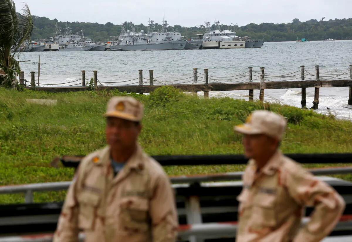 Sailors on guard at the Cambodian Ream Naval Base in Sihanoukville, Cambodia, on July 26, 2019. (Samrang Pring/Reuters)