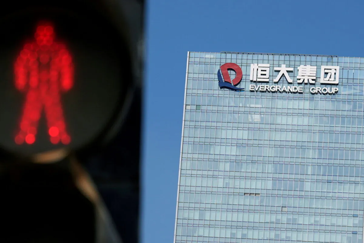 A traffic light is seen near the headquarters of China Evergrande Group in Shenzhen, Guangdong Province, China on Sept. 26, 2021. (Aly Song/Reuters File Photo)