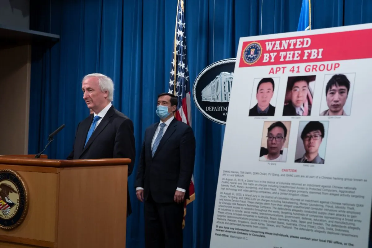 Deputy Attorney General Jeffery Rosen speaks to the media about charges and arrests related to a computer intrusion campaign tied to the Chinese regime by a group called APT41 at the Department of Justice in Washington, on Sept. 16, 2020. (Tasos Katopodis/Pool/Getty Images)