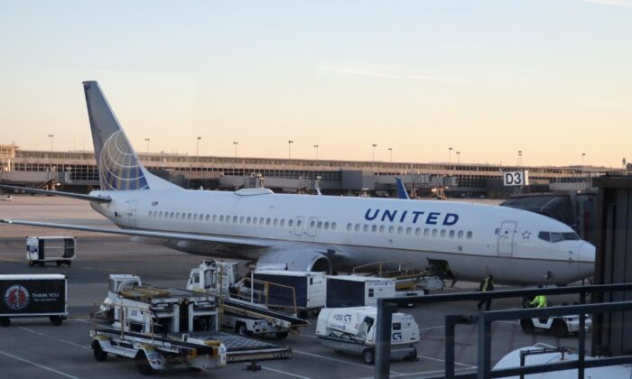 A United Airlines Boeing 737 plane is seen at the gate at Washington's Dulles International Airport in Dulles, Va.,, on March 2, 2021. (Daniel Slim/AFP via Getty Images)