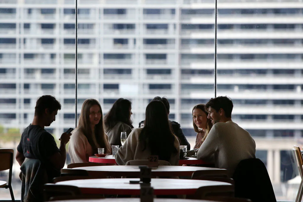 Patrons return to the MCA Cafe (Museum of Contemporary Art Australia) in Sydney, Australia, on Oct. 12, 2021. (Lisa Maree Williams/Getty Images)