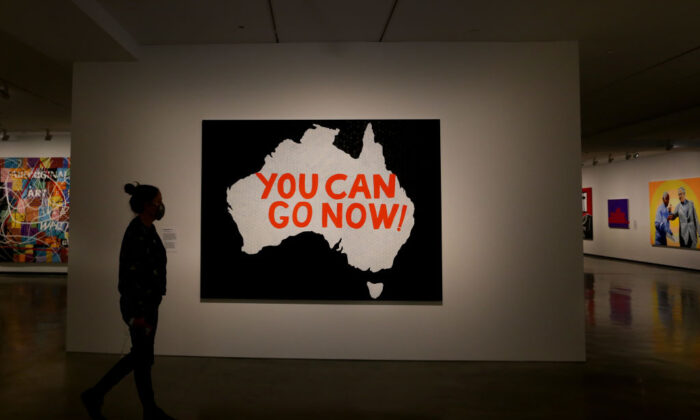 A person takes in the work of artist Richard Bell at the MCA (Museum of Contemporary Art Australia) in Sydney, Australia, on Oct. 12, 2021. (Lisa Maree Williams/Getty Images)