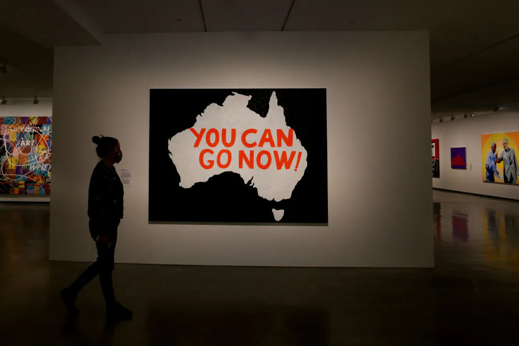 A person takes in the work of artist Richard Bell at the MCA (Museum of Contemporary Art Australia) in Sydney, Australia, on Oct. 12, 2021. (Lisa Maree Williams/Getty Images)