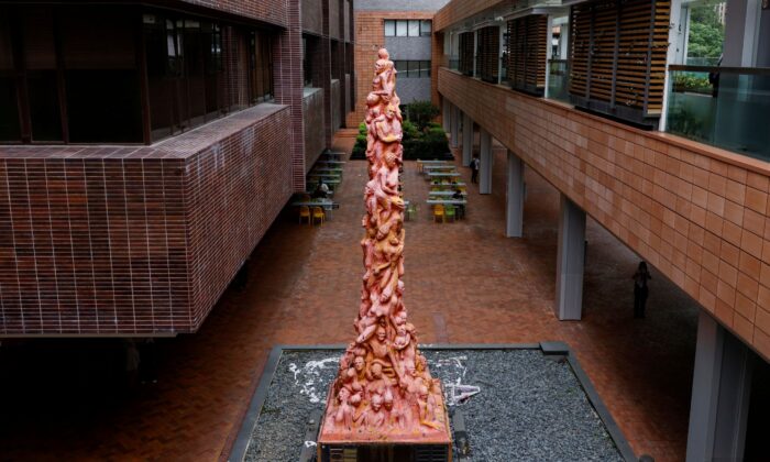  eight-meter-high (26-foot-high) "Pillar of Shame" by Danish sculptor Jens Galschiot to pay tribute to the victims of the Tiananmen Square massacre in Beijing on June 4, 1989, is seen before it is set to be removed at the University of Hong Kong (HKU) in Hong Kong, China, on Oct. 12, 2021. (Tyrone Siu/Reuters)