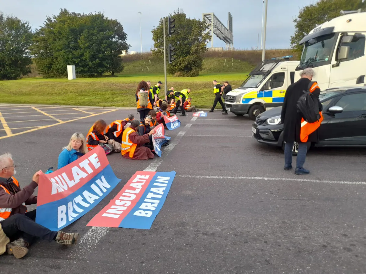 Protesters from Insulate Britain block the M25 at junction 31, near to the Dartford Crossing in Thurrock, Essex, on Oct. 13, 2021. (Insulate Britain/PA)
