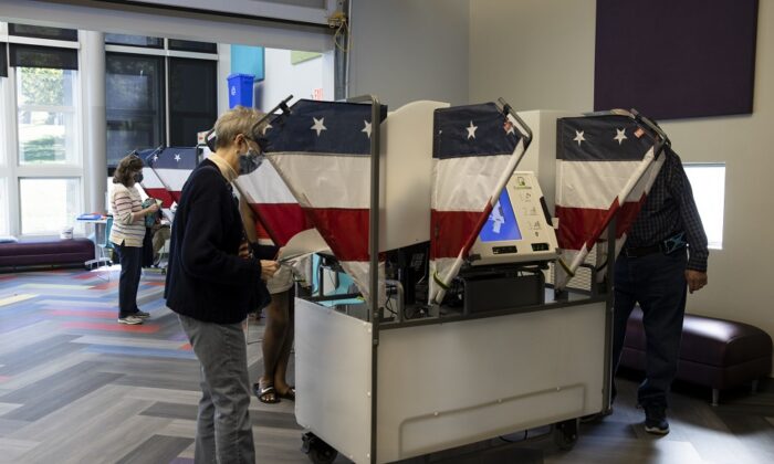 Voters cast their ballots during early voting at a Nashville Public Library building in Nashville, Tenn., on Oct. 14, 2020. (Brett Carlsen/Getty Images)