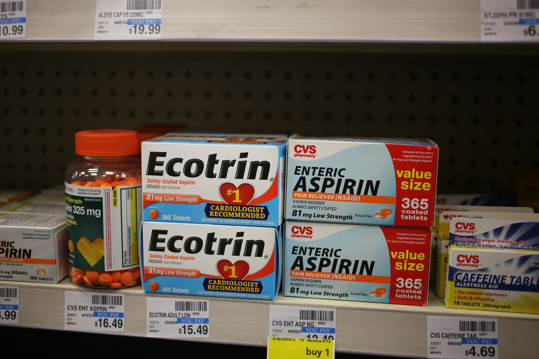 Boxes holding bottles with 81 mg aspirin tablets inside are seen on a store shelf in Miami, Florida on April 12, 2016. (Joe Raedle/Getty Images)