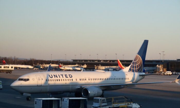 A United Airlines Boeing 737 at the gate at Washington's Dulles International Airport in Dulles, Va., on March 2, 2021. (Daniel Slim/AFP via Getty Images)