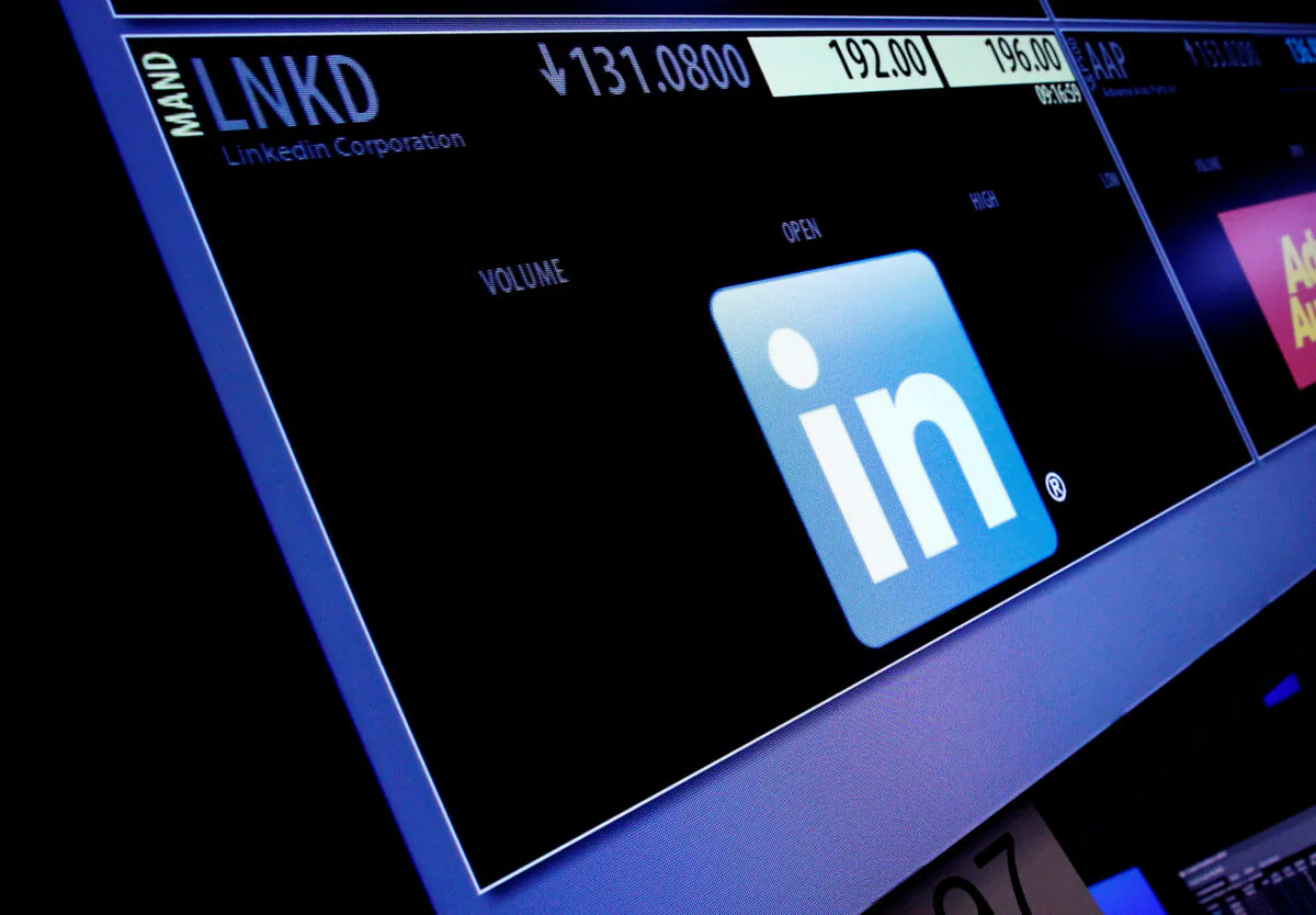 The ticker symbol and trading information for LinkedIn Corp. is displayed on a screen at the post where it's traded, before the start of trading, on the floor of the New York Stock Exchange (NYSE) in New York on June 13, 2016. (Brendan McDermid/Reuters)
