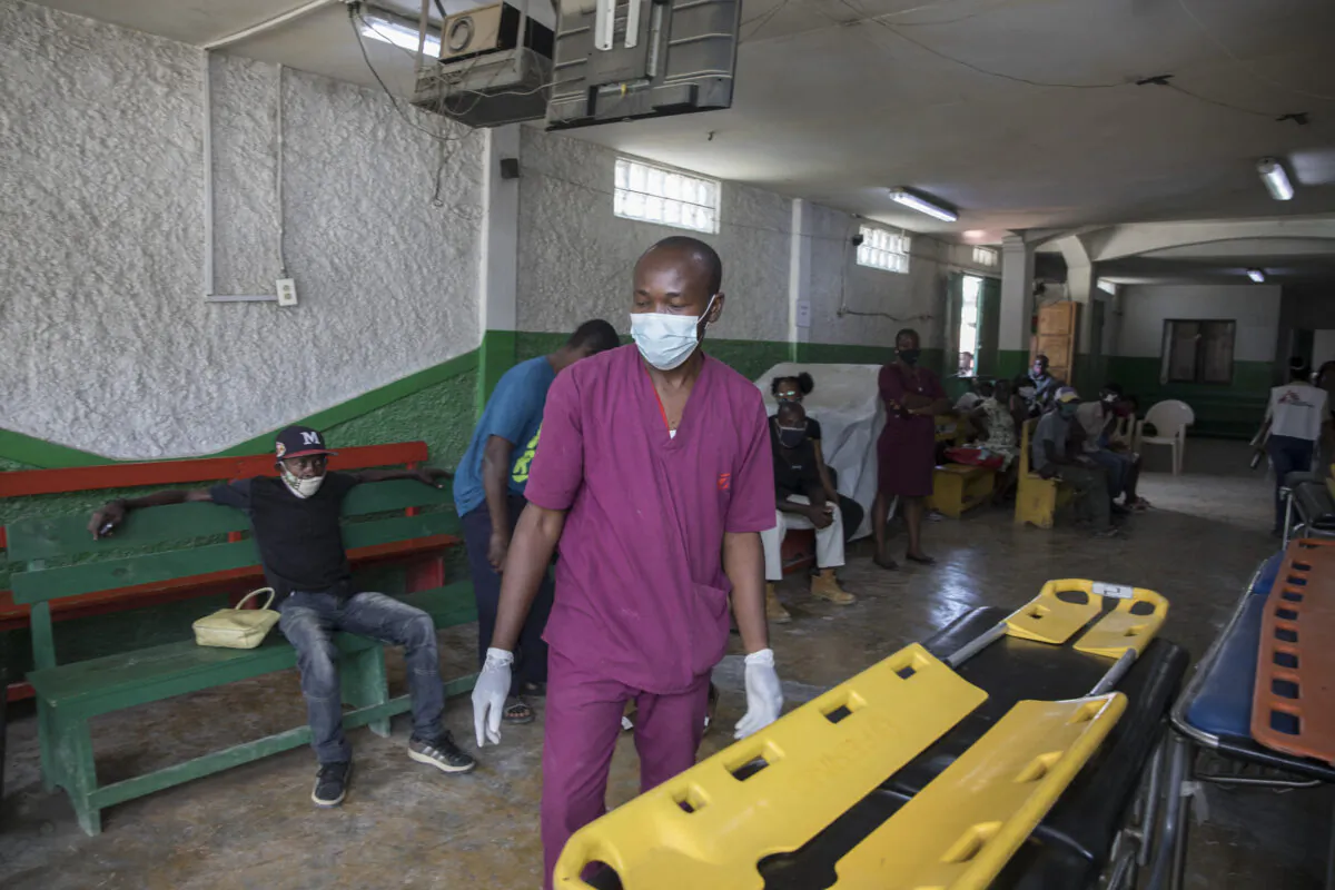 A medical worker is seen at the Martissant Hospital, in Martissant, Haiti, on May 31, 2021. (Photo by Valerie Baeriswyl/AFP via Getty Images)