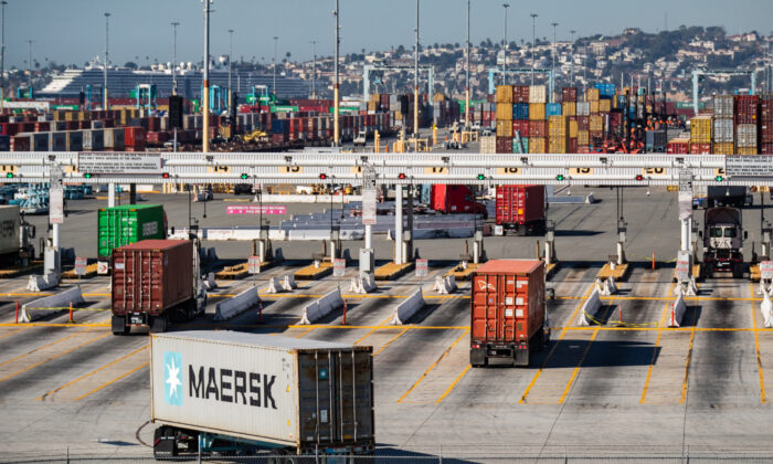 Shipping containers wait to be transferred from the ports of Los Angeles and Long Beach on Oct. 14, 2021. (John Fredricks/  Pezou)