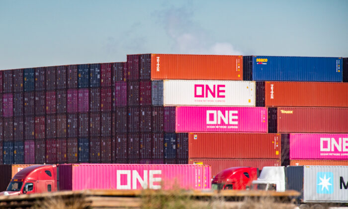 Shipping containers wait to be transferred from the ports of Los Angeles and Long Beach on Oct. 14, 2021. (John Fredricks/The Epoch Times)