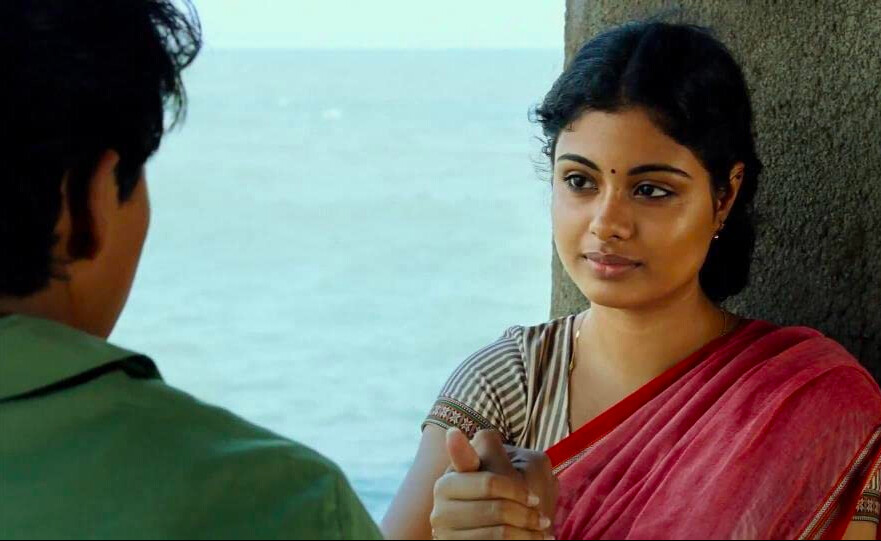 boy and girl in front of ocean in Life of Pi
