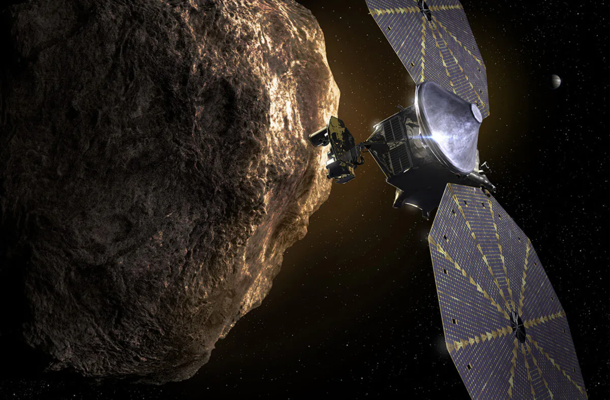 This image provided by the Southwest Research Institute depicts the Lucy spacecraft approaching an asteroid. (SwRI via AP)
