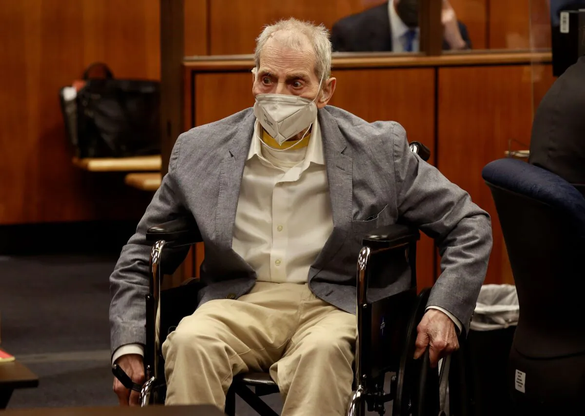 Robert Durst in his wheelchair as he appears in an Inglewood courtroom with his attorneys for closing arguments presented by the prosecution in the murder trial in Inglewood, Calif., on Sept. 8, 2021. (Al Seib - Pool/Getty Images)