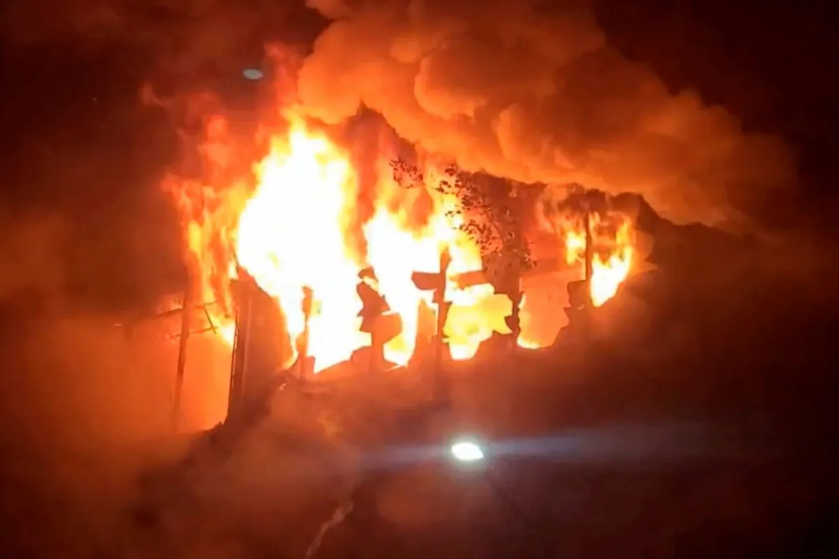 In this image taken from video by Taiwan's EBC, fire and smoke pour out from a building in Kaohsiung, in southern Taiwan on Oct. 14, 2021. (EBC via AP)