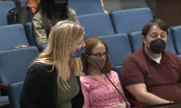 In this image from video, Fairfax, Va., parent Stacy Langton is seen during a school board meeting in Fairfax County, Va., on Sept. 24, 2021. (  Pezou vis FCPS)