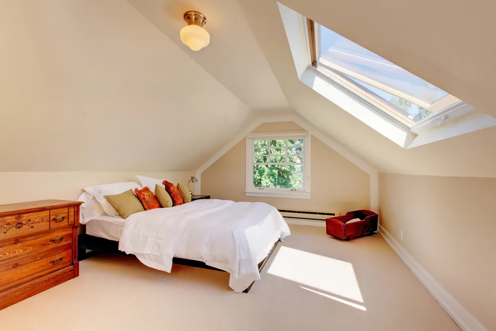 Skylights bring more natural light into a room, cutting down on artificial light electricity costs. (Artazum/Shutterstock)