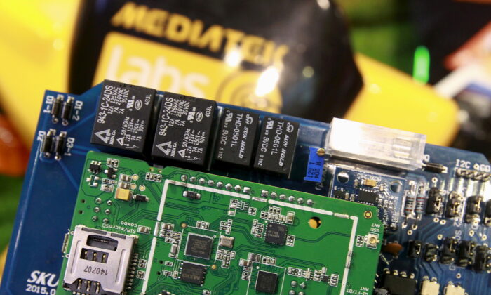 MediaTek chips are seen connected  a improvement  committee  astatine  the MediaTek booth during the 2015 Computex accumulation  successful  Taipei, Taiwan, connected  June 3, 2015. (Pichi Chuang/Reuters, File Photo)