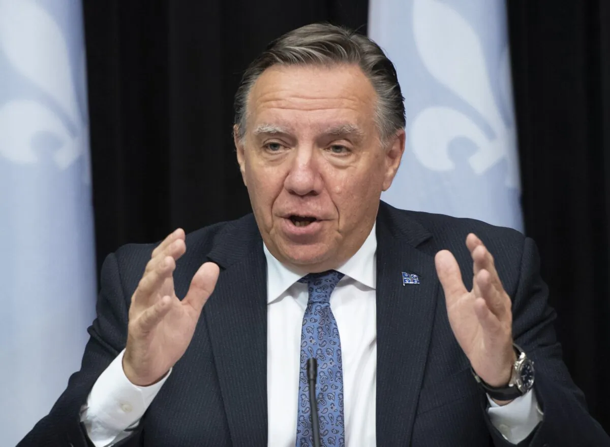 Quebec Premier Francois Legault speaks at a news conference at the legislature in Quebec City on Sept. 23, 2021. The province has postponed mandatory vaccination for health-care workers until Nov. 15 due to the impact it will have on services. Meanwhile, Quebec’s college of physicians says all doctors must be vaccinated or have their licences suspended. (The Canadian Press/Jacques Boissinot)