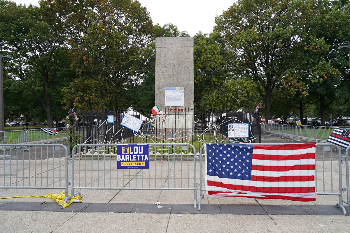 Marconi Plaza's iconic Christopher Columbus statue is still covered by a wooden box and can’t be displayed during the parade and celebration in South Philadelphia, Pa., on Oct. 10, 2021. (William Huang/The Epoch Times) 