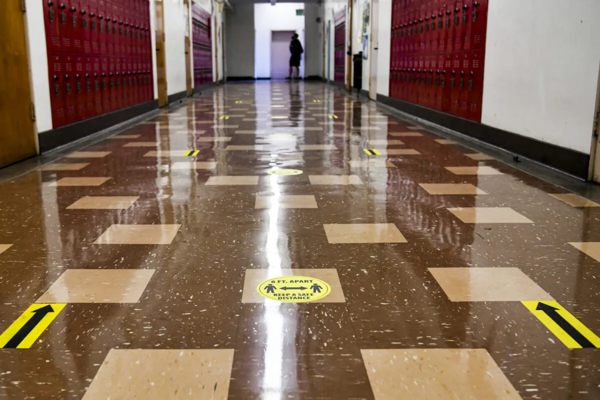 A hallway with social distance decal reminders are seen at Hollywood High School in Los Angeles on April 27, 2021. (Rodin Eckenroth/Getty Images)