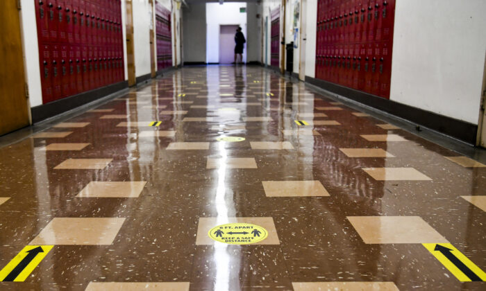 A hallway with social distance decal reminders are seen at Hollywood High School in Los Angeles on April 27, 2021. (Rodin Eckenroth/Getty Images)