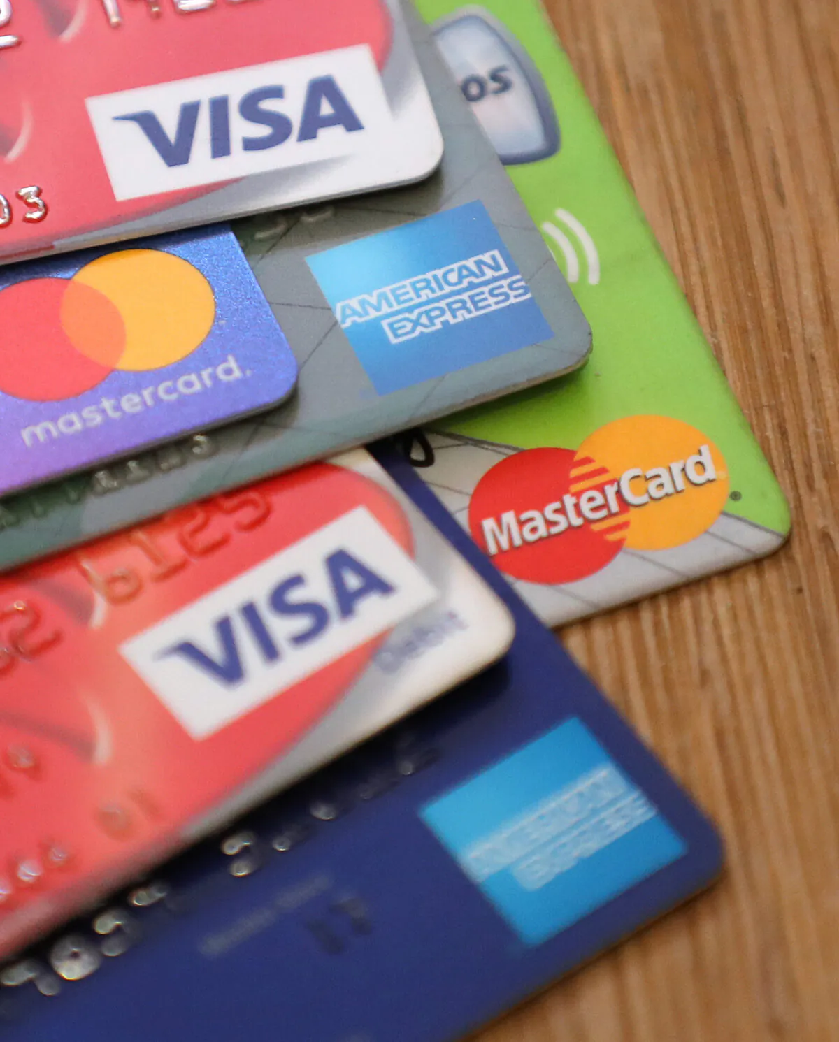 A pile of credit and debit cards in a file photo dated July 18, 2018. (Andrew Matthews/PA)