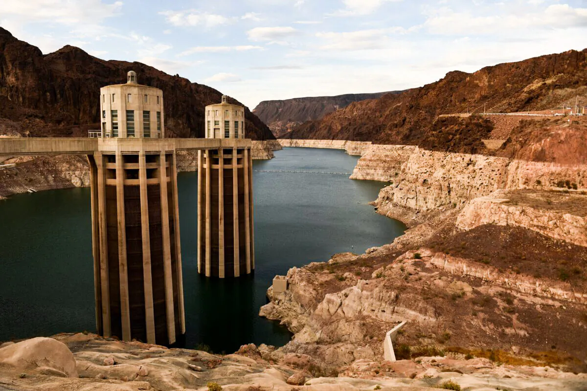 Intake towers for water to enter to generate electricity and provide hydroelectric power stand during low water levels due the western drought on July 19, 2021 at the Hoover Dam on the Colorado River at the Nevada and Arizona state border. The Lake Mead reservoir formed by the Hoover Dam on the Nevada–Arizona border provides water to the Southwest, including nearby Las Vegas as well as Arizona and California, but has remained below full capacity since 1983 due to increased water demand and drought, conditions that are expected to continue. (Photo by Patrick T. FALLON / AFP) (Photo by PATRICK T. FALLON/AFP via Getty Images)