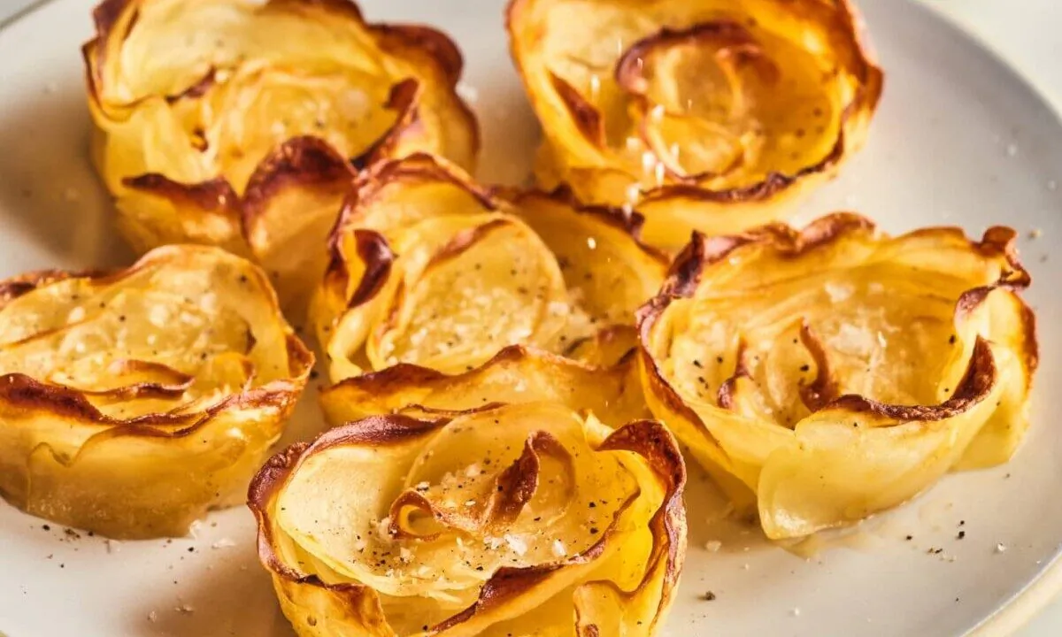 These easy-yet-impressive potato roses have velvety centers with light and super-crispy edges. (Joe Lingeman/TNS)