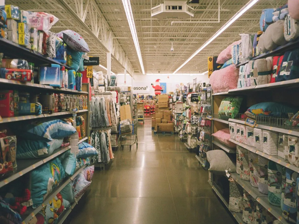 A store isle at the Walmart Supercenter in Thornton, Colo., in a file photo. (Caique Morais/Unsplash)