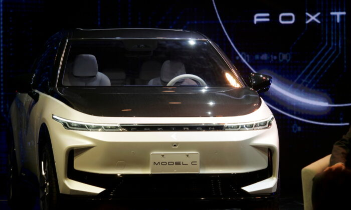 A Foxtron Model C electric vehicle (EV) is seen unveiled at a Foxconn event in Taipei, Taiwan, on Oct. 18, 2021. (Fabian Hamacher/Reuters)