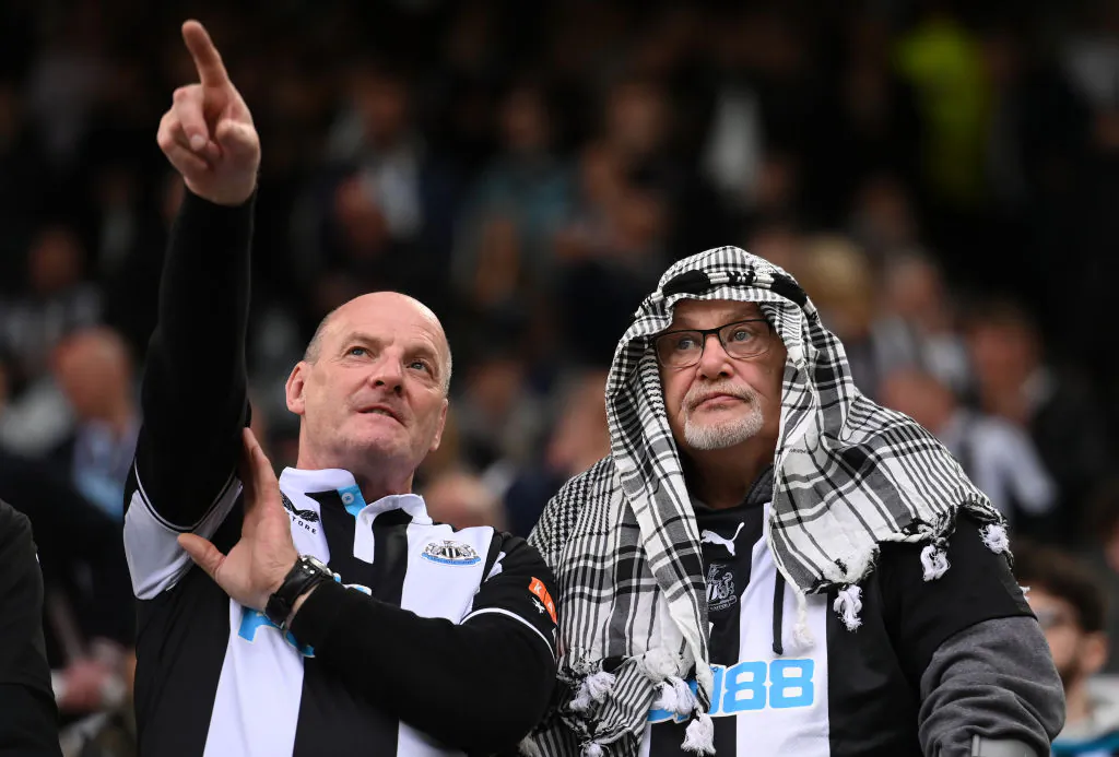 Newcastle United fans in dress pictured in the Gallowgate End before the Premier League match between Newcastle United and Tottenham Hotspur at St. James Park, England, on Oct. 17, 2021. (Stu Forster/Getty Images)