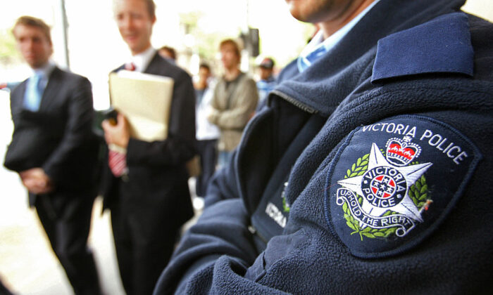 Victorian police maintain a heavy presence outside the Melbourne Magistrates Court in Victoria, Australia, on Apr. 3, 2006. (William West/AFP via Getty Images)