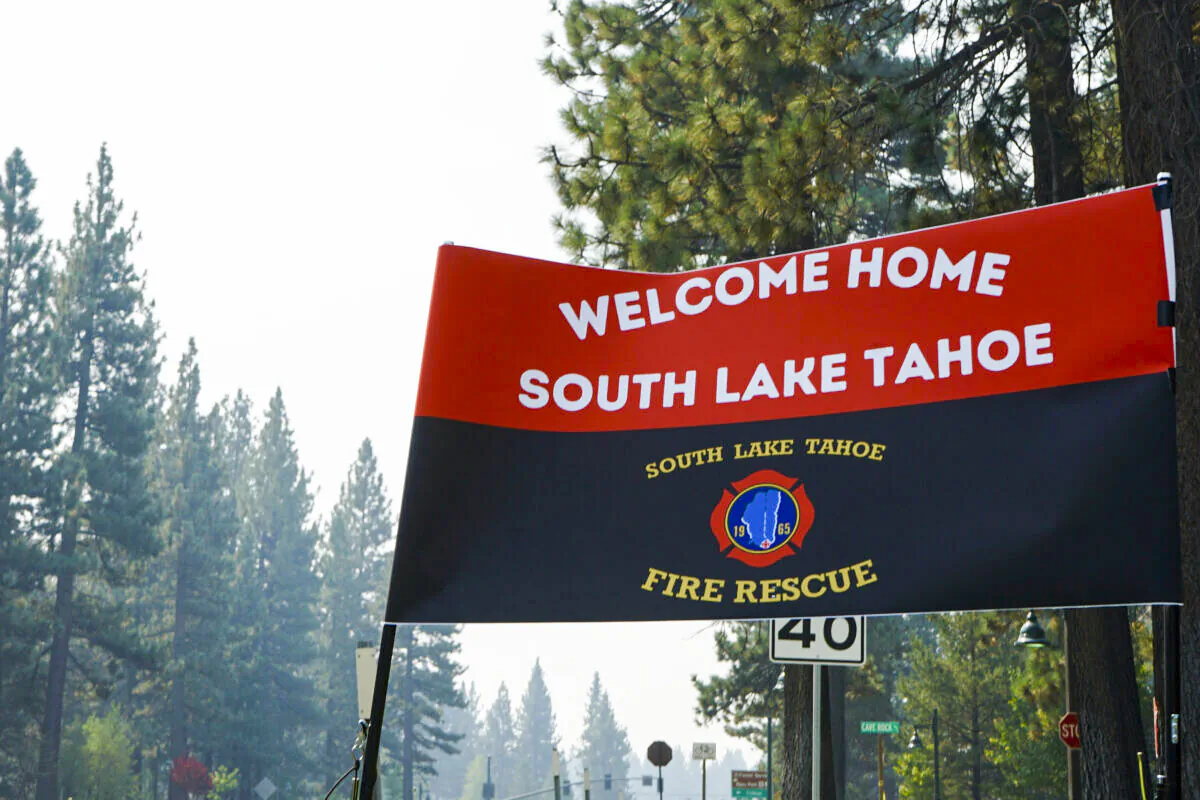 A sign outside a Fire Station welcomes residents back to town after the lifting of the evacuation order at South Lake Tahoe, Calif., on Sept. 6, 2021. (Samuel Metz/AP Photo)